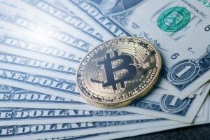 Bitcoin on dollar bills