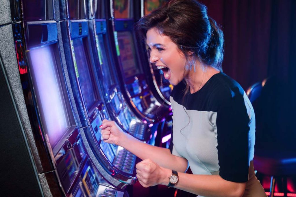 Happy woman won slot machine games