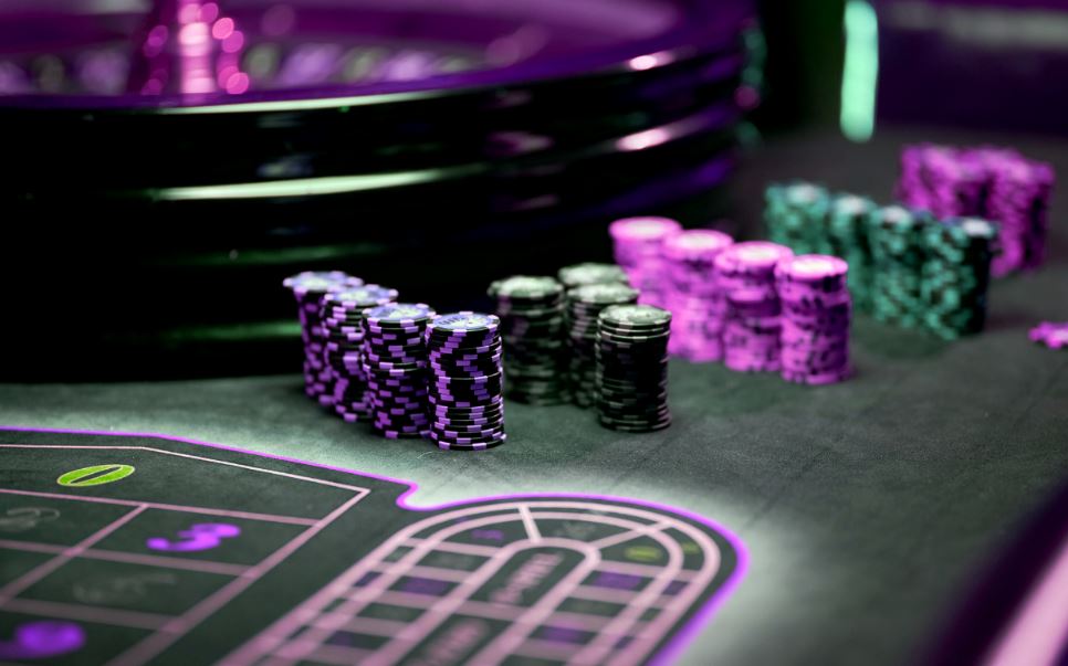 Multicolored casino table with colored casino chips